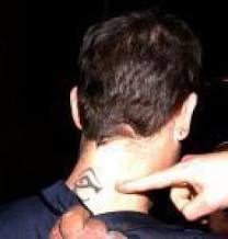 Robbie Williams horus tattoo
