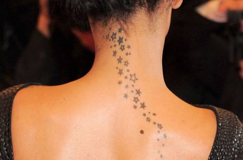 Rihanna stars back tattoo