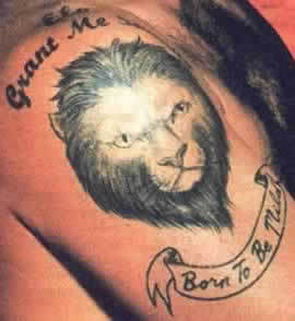 Robbie Willimas lion head tattoo