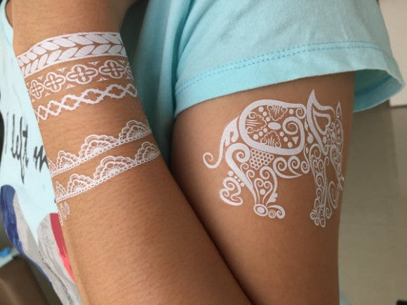 white lace elephant tattoo