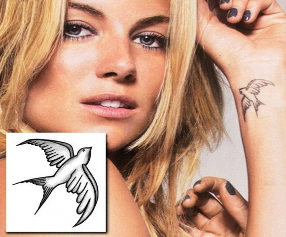 Sienna Miller swallow tattoo