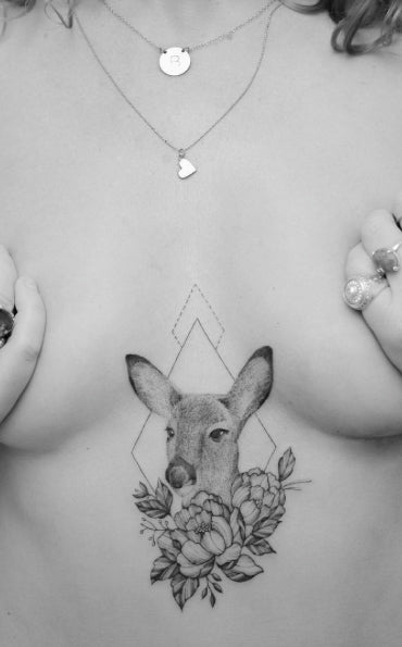 Delightful doe tattoo on sternum