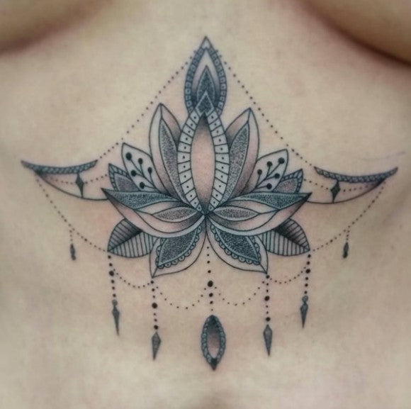 Lotus flower sternum tattoo