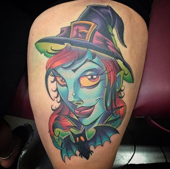 Witch tattoo on thigh by Tony Ciavarro