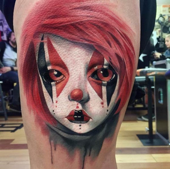 Creepy clown tattoo by Kerry Irvine