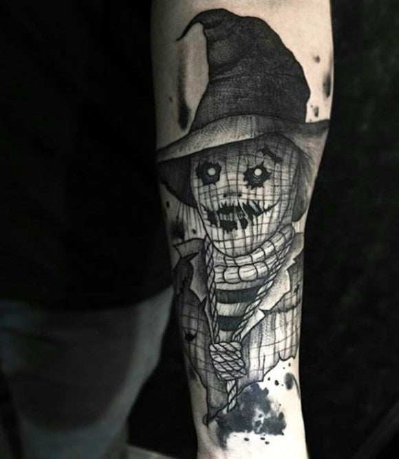 Blackwork scarecrow tattoo by Felipe Mello