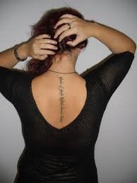 Font tattoo on the back