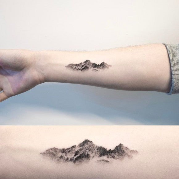 Tattoo of a mountain